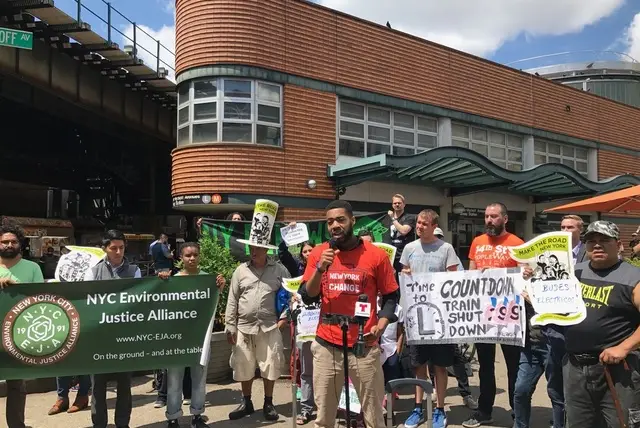 Patrick Houston, an organizer with NY Communities For Change, connecting the need for climate change action with the coming shutdown
